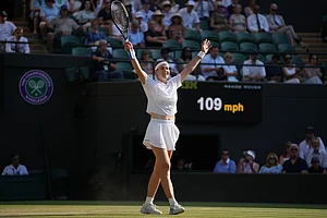 | Photo: AP/Kin Cheung : Karolina Muchova of Czech Republic celebrates her victory against Naomi Osaka of Japan in their quarter-final women's singles match at the Wimbledon Tennis Championships in London.