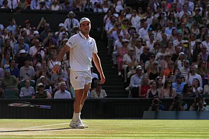 AP/Brian Inganga : Arthur Fery of Britain reacts to winning against Flavio Cobolli of Italy in their quarter-final men's singles match at the Wimbledon.