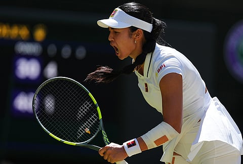 Alexandra Eala of the Philippines reacts during the women's singles fourth round match against Jasmine Paolini of Italy at the Wimbledon Tennis Championships in London, Monday, July 6, 2026.