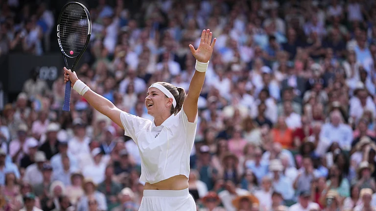 Karolina Muchova of the Czech Republic celebrates her victory against Coco Gauff of the United States in their semifinal women's singles match at the Wimbledon Tennis Championships in London, Thursday, July 9, 2026. - (AP Photo/Kin Cheung)