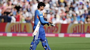 Steven Paston/AP Photo : India's Vaibhav Sooryavanshi leaves the field after being caught out by England's Sam Curran from the bowling of Jofra Archer during the fourth Vitality IT20 match against England at the Seat Unique Stadium in Bristol.