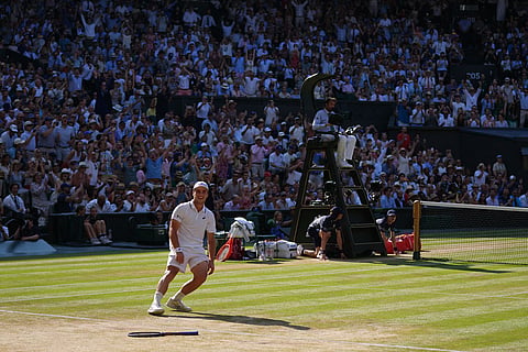 Arthur Fery of Britain reacts to winning against Flavio Cobolli of Italy in their quarter-final men's singles match at the Wimbledon Tennis Championships in London.