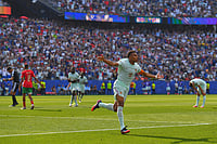 AP/Steven Senne : France's Kylian Mbappe celebrates scoring the opening goal during the World Cup quarterfinal soccer match