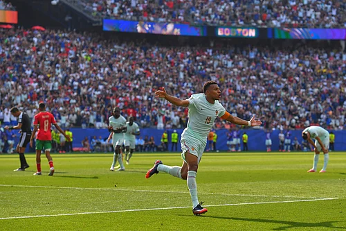 AP/Steven Senne : Frances Kylian Mbappe celebrates scoring the opening goal during the World Cup quarterfinal soccer match