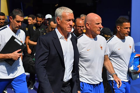 France head coach Didier Deschamps walks onto the pitch for the World Cup quarterfinal soccer match between France and Morocco