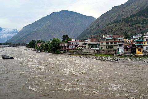Beas river flows in spate after heavy rain, in Kullu, Wednesday, July 8, 2026. 