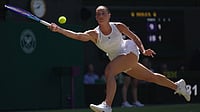 Wimbledon 2026: Who Won And Eliminated Yesterday In Ladies' Singles Quarter-Final Matches? Photo: AP/Brian Inganga : Marta Kostyuk of Ukraine returns the ball to Jasmine Paolini of Italy, in their quarter-final women's singles match at the Wimbledon Tennis Championships in London.