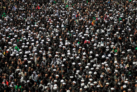 Mourners gather in prayer during the funeral procession for the late Iranian Supreme Leader Ayatollah Ali Khamenei inside the Imam Ali Shrine in Najaf, Iraq, Wednesday, July 8, 2026. 