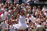From Underdog to Title Contender: Marta Kostyuk Powers Into Wimbledon 2026 Semi-Final | Photo: AP/Brian Inganga : Marta Kostyuk of Ukraine dances to celebrate her victory against Jasmine Paolini of Italy in their quarter-final women's singles match at the Wimbledon Tennis Championships in London.