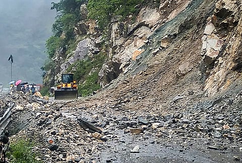 Debris from a landslide blocks the Gangotri National Highway near Nalupani following heavy rainfall, in Uttarkashi. Debris clearance work is underway. 