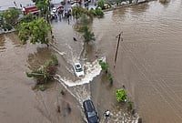 | Photo: PTI/Kunal Patil : Vehicles make their way through a waterlogged road after heavy rainfall, at Vasai-Virar in Palghar district, Maharashtra, Wednesday, July 8, 2026. 
