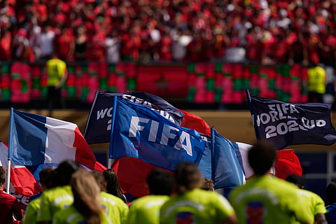 A FIFA flag waves in the air before the World Cup quarterfinal soccer match between France and Morocco in Foxborough
