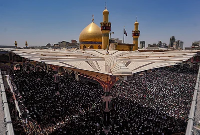 | Photo: AP/Anmar Khalil : Mourners gather in prayer during the funeral procession for the late Iranian Supreme Leader Ayatollah Ali Khamenei inside the Imam Ali Shrine in Najaf, Iraq, Wednesday, July 8, 2026.
