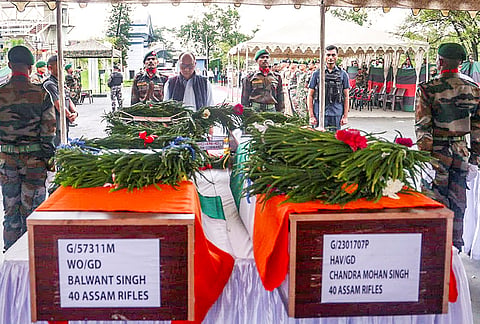 Manipur Chief Minister Yumnam Khemchand Singh pays tribute to two personnel of the 40th Battalion of the Assam Rifles during a wreath-laying ceremony at Imphal Airport. The ceremony paid final respects to Warrant Officer Balwant Singh and Havildar Chandra Mohan Singh. 