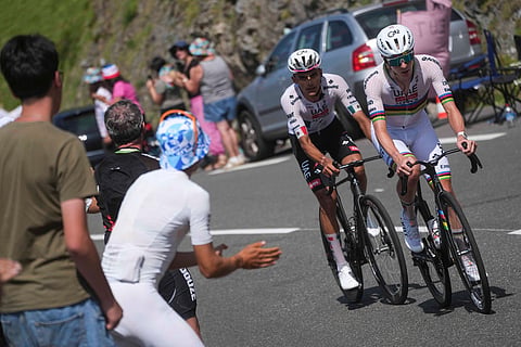 Slovenia's Tadej Pogacar and Mexico's Isaac Del Toro lead the race during the sixth stage of the Tour de France cycling race over 201.5 kilometers (115.5 miles) with start in Pau and finish in Gavarnie-Gedre, France.