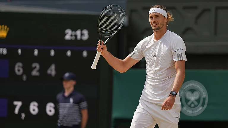 Alexander Zverev of Germany celebrates after defeating Arthur Fery of Britain in their men's singles semifinal match at the Wimbledon Tennis Championships in London. - Kirsty Wigglesworth/AP Photo