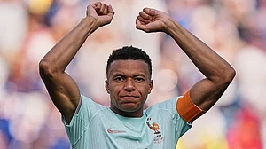 | Photo: AP/Martin Meissner : Frances Kylian Mbappe (10) celebrates after winning the World Cup quarterfinal soccer match between France and Morocco in Foxborough, Mass., near Boston, Thursday, July 9, 2026.