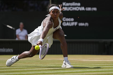 Coco Gauff of the United States returns the ball to Karolina Muchova of the Czech Republic in their semifinal women's singles match at the Wimbledon Tennis Championships in London.