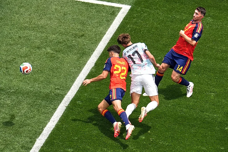 Belgiums Charles De Ketelaere (17) scores their first goal during the World Cup quarterfinal soccer match between Spain and Belgium in Inglewood