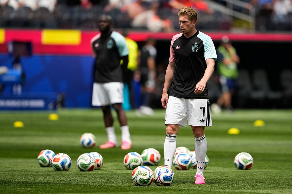 Belgiums Kevin De Bruyne (7) warms up before the start of the World Cup quarterfinal soccer match between Spain and Belgium in Inglewood