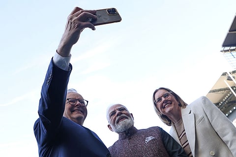 Australian Prime Minister Anthony Albanese takes a selfie with Indian Prime Minister Narendra Modi and the Premier of Victoria, Jacinta Allan at the Melbourne Cricket Ground in Melbourne, Australia.