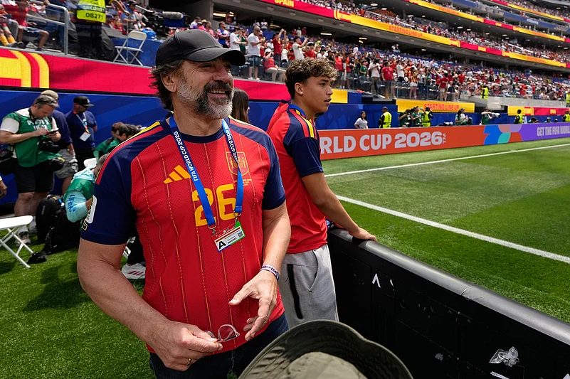 Actor Javier Bardem waits for the start of the World Cup quarterfinal soccer match between Spain and Belgium in Inglewood