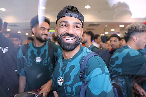 Mohamed Salah, smiles as he is greeted by fans upon the Egyptian national soccer team arrival at El-Alamein airport, 160 km (99 miles) west of Alexandria, Egypt.