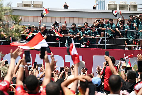 Fans crowd to greet the Egyptian national soccer team during their arrival at El-Alamein airport, 160 km (99 miles) west of Alexandria, Egypt.