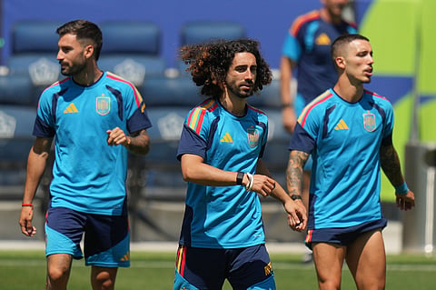 Spain's Marc Cucurella, center, and teammates attend a training session ahead of a World Cup quarterfinal soccer match against Belgium in Carson