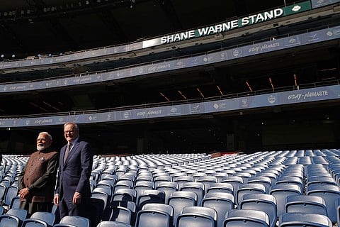 Indian Prime Minister Narendra Modi, left, and Australian Prime Minister Anthony Albanese pose for a photo at the Melbourne Cricket Ground in Melbourne, Australia.