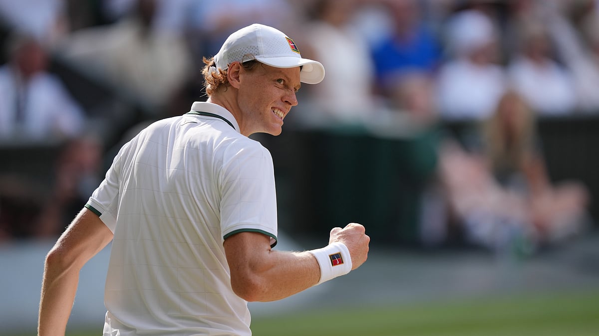 Jannik Sinner of Italy celebrates a point against Novak Djokovic of Serbia in their men's singles semifinal match at the Wimbledon Tennis Championships in London, Friday, July 10, 2026. - (AP Photo/Kin Cheung)
