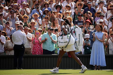 Coco Gauff of the United States leaves after losing against Karolina Muchova of the Czech Republic in their semifinal women's singles match at the Wimbledon Tennis Championships in London.