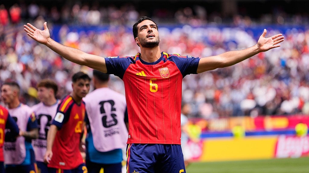 Spain's Mikel Merino (6) celebrates scoring their second goal during the World Cup quarterfinal soccer match between Spain and Belgium in Inglewood - Mark J. Terrill/AP Photo