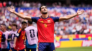Mark J. Terrill/AP Photo : Spain's Mikel Merino (6) celebrates scoring their second goal during the World Cup quarterfinal soccer match between Spain and Belgium in Inglewood