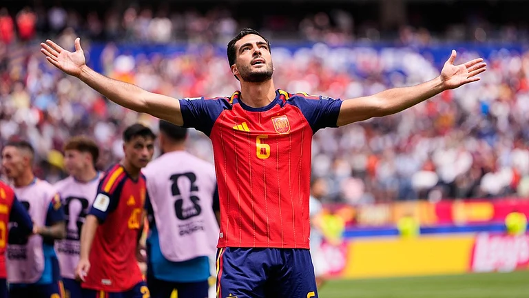 Spain's Mikel Merino (6) celebrates scoring their second goal during the World Cup quarterfinal soccer match between Spain and Belgium in Inglewood - Mark J. Terrill/AP Photo