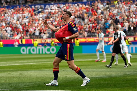 Spain's Fabian Ruiz (8) reacts after scoring the opening goal of his team during the World Cup quarterfinal soccer match between Spain and Belgium in Inglewood