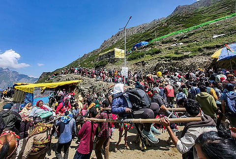 Pilgrims move towards Amarnath cave shrine during the ongoing annual Amarnath Yatra 2026, in Baltal, Ganderbal district, Jammu and Kashmir.
