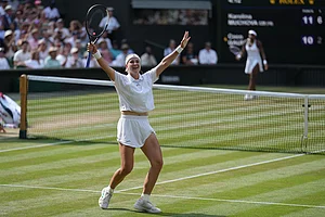 | Photo: AP/Kirsty Wigglesworth : Karolina Muchova of the Czech Republic celebrates her victory against Coco Gauff of the United States in their semifinal women's singles match at the Wimbledon Tennis Championships in London.