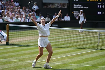 | Photo: AP/Kirsty Wigglesworth : Karolina Muchova of the Czech Republic celebrates her victory against Coco Gauff of the United States in their semifinal women's singles match at the Wimbledon Tennis Championships in London.