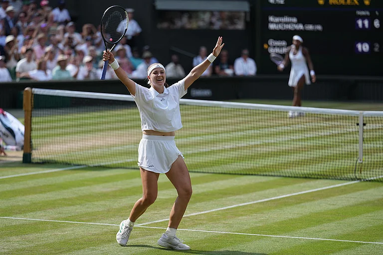 Karolina Muchova of the Czech Republic celebrates her victory against Coco Gauff of the United States in their semifinal women's singles match at the Wimbledon Tennis Championships in London. - | Photo: AP/Kirsty Wigglesworth