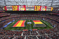 Marcio Sanchez/AP Photo : Spanish and Belgian flags are seen during the teams presentation before the World Cup quarterfinal soccer match between Spain and Belgium in Inglewood