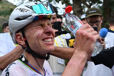 Slovenia's Tadej Pogacar reacts after winning the sixth stage of the Tour de France cycling race with start in Pau and finish in Gavarnie-Gedre, France.