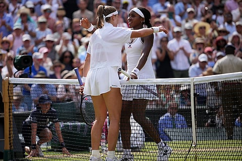 Karolina Muchova of the Czech Republic, left, and Coco Gauff of the United States hug each other at the end of their semifinal women's singles match at the Wimbledon Tennis Championships in London.