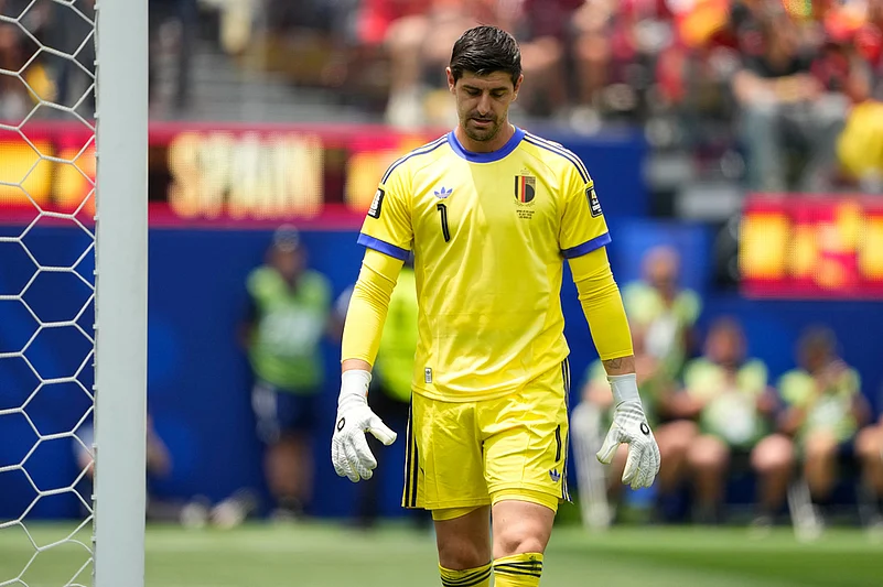 Belgium goalkeeper Thibaut Courtois (1) reacts after Spains Fabian Ruiz (8) scored the opening goal during the World Cup quarterfinal soccer match between Spain and Belgium in Inglewood