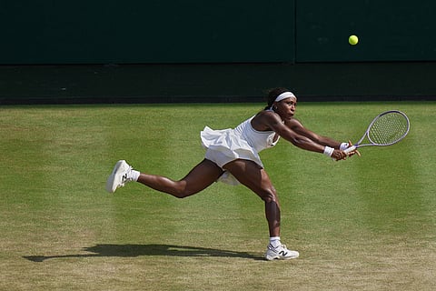 Coco Gauff of the United States hits a return to Karolina Muchova of Czech Republic during their women's singles semifinal match at the Wimbledon Tennis Championships in London.