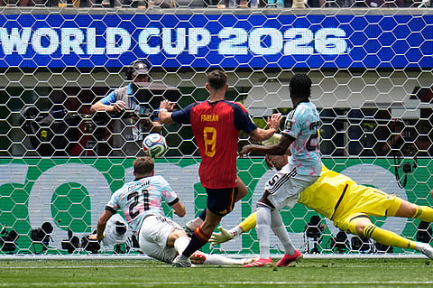 pain's Fabian Ruiz (8) scores their opening goal during the World Cup quarterfinal soccer match between Spain and Belgium in Inglewood
