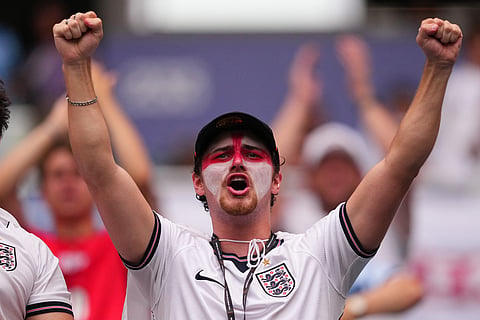 A fan of England cheers prior to a World Cup quarterfinal soccer match between England and Norway in Miami Gardens, Fla., Saturday, July 11, 2026.
