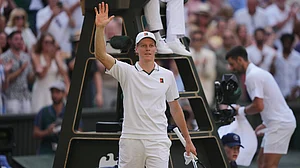AP Photo/Kin Cheung : Jannik Sinner of Italy celebrates winning against Novak Djokovic of Serbia in their men's singles semifinal match at the Wimbledon Tennis Championships in London, Friday, July 10, 2026.