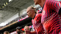 (AP Photo/Rebecca Blackwell) : Norway's Erling Haaland runs on to the pitch for warmup before the World Cup quarterfinal soccer match between Norway and England in Miami Gardens, Fla., Saturday, July 11, 2026.