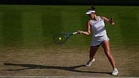 | Photo: AP/Maja Smiejkowska : Linda Noskova of Czech Republic hits a return to Marta Kostyuk of Ukraine during their women's singles semifinal match at the Wimbledon Tennis Championships in London.